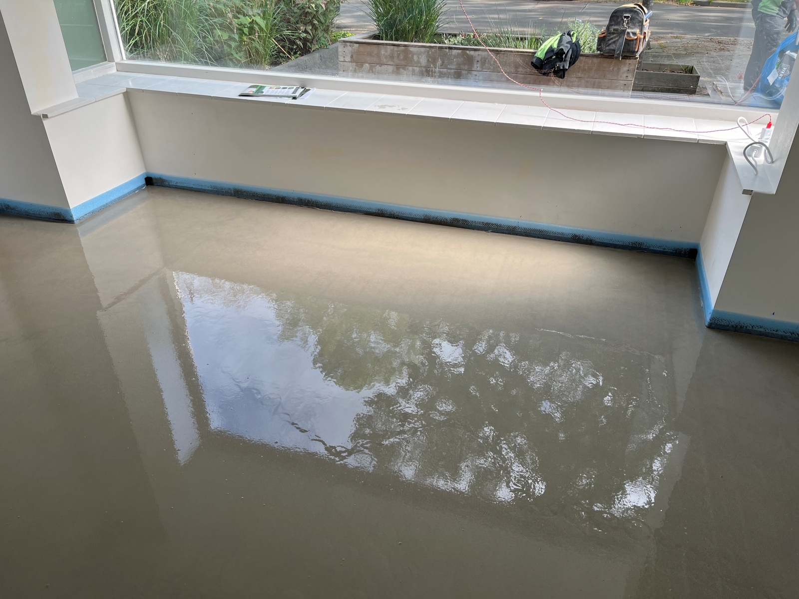 woonkamer met vloerverwarming vulmassa