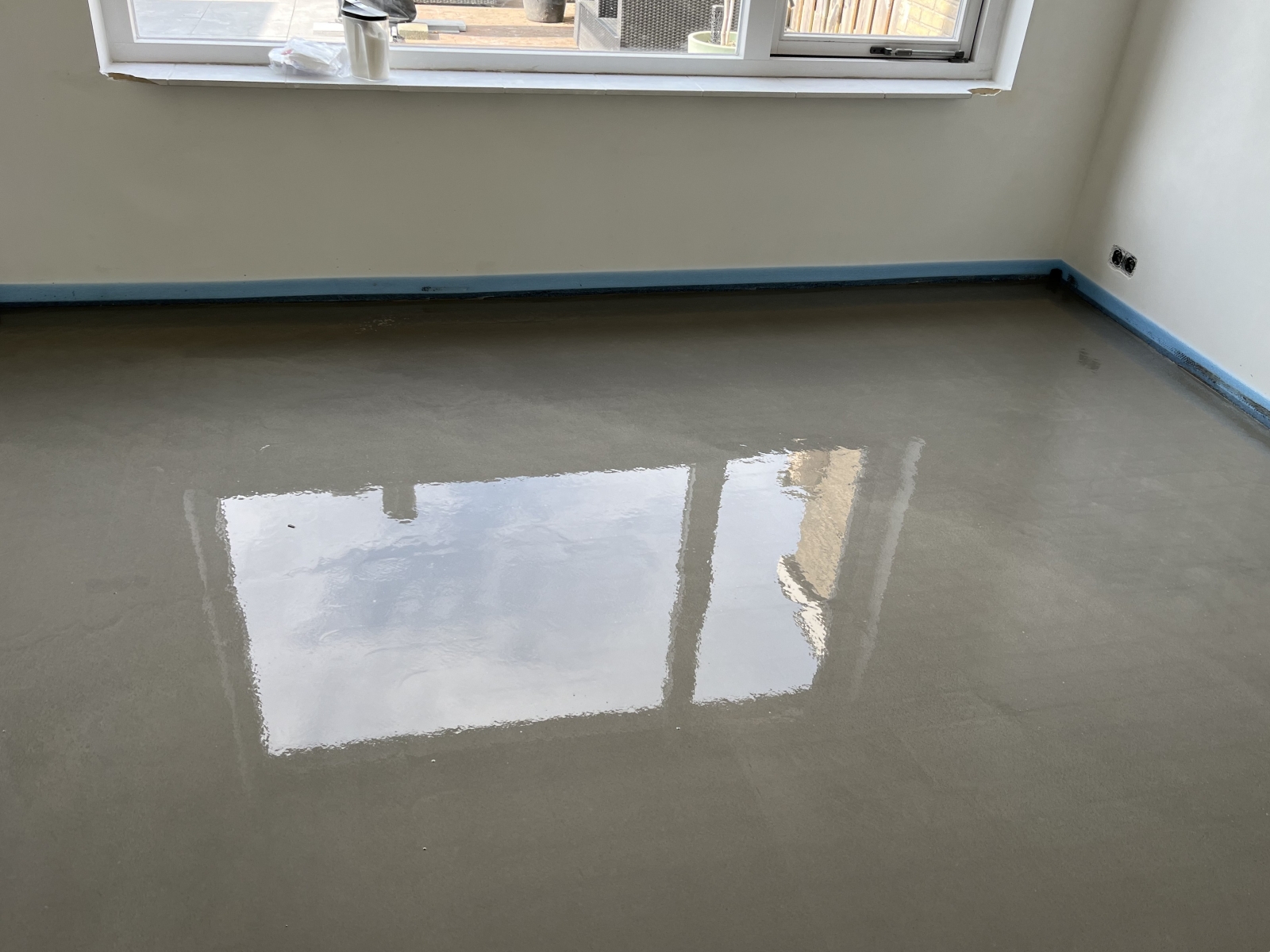 woonkamer vloerverwarming met vulmassa