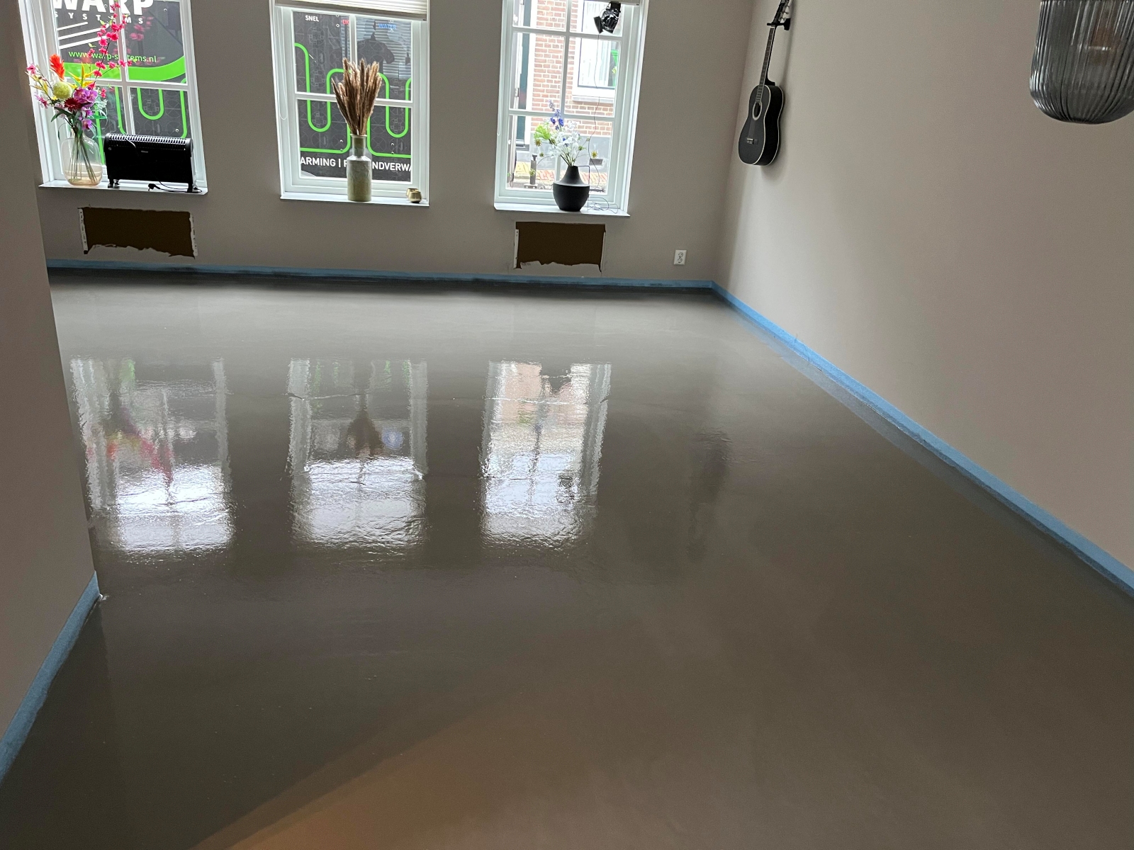 woonkamer vloerverwarming met vulmassa