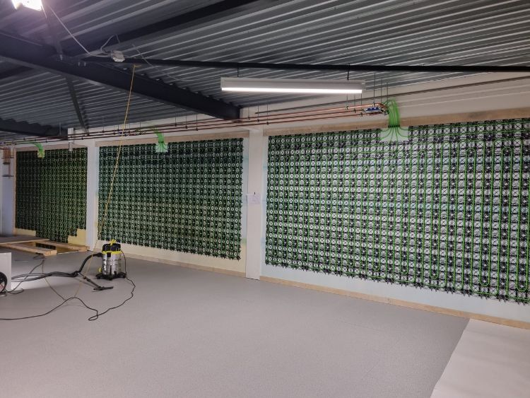 Wandverwarming voor afwerklaag