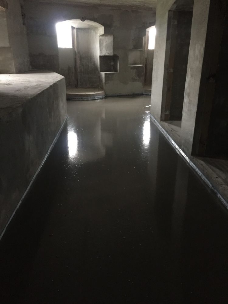 Vloerverwarming in historisch gebouw met afwerking