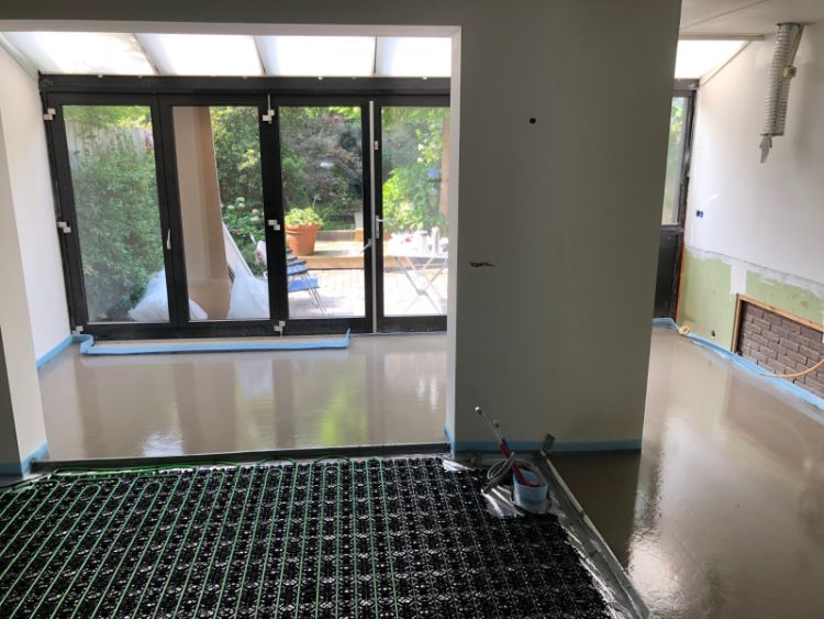 WARP Systems woning SpeeTile systeem met SpeeTop vulmassa