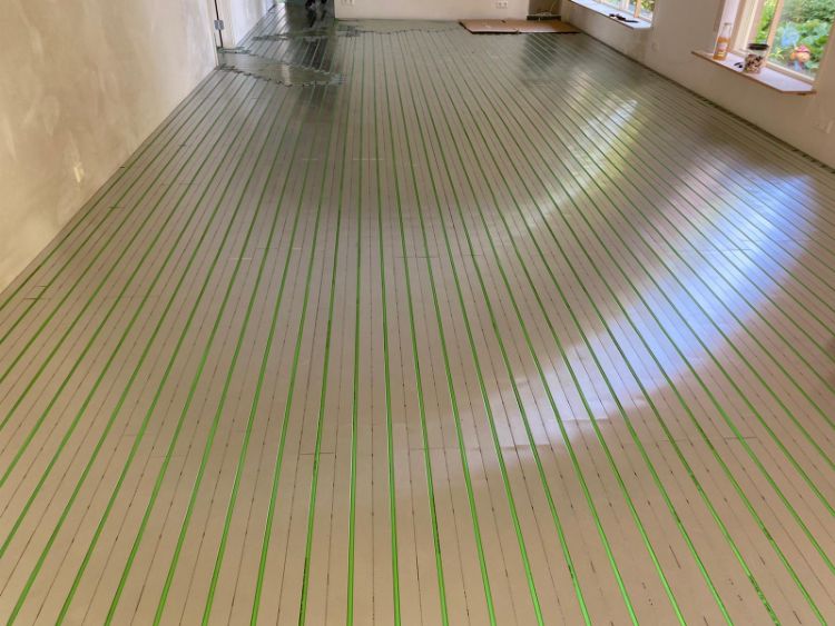 Vloerverwarming op houten vloer