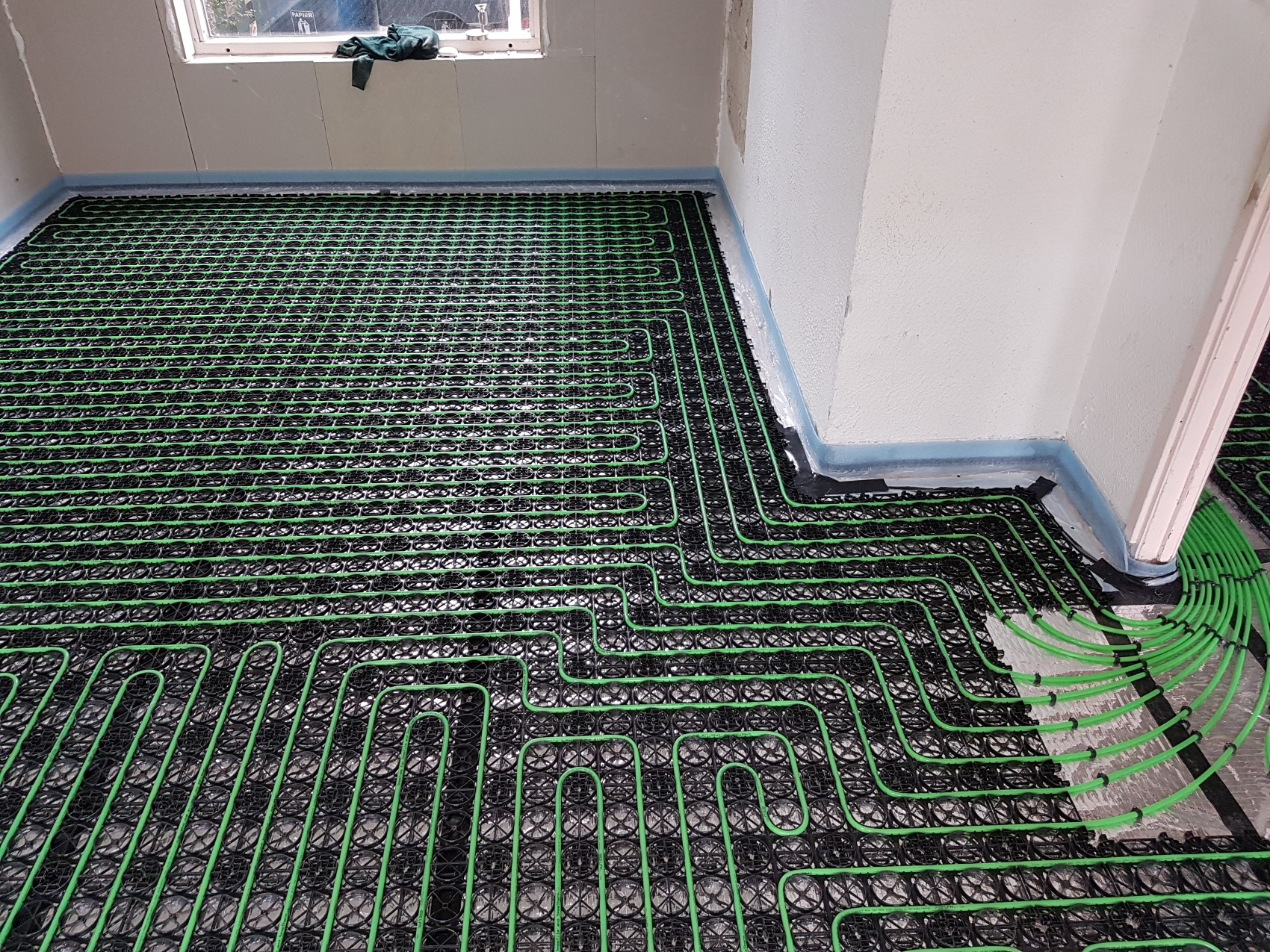 WARP Systems vloerverwarming op houten vloer