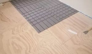 Vloerverwarming op houten vloer